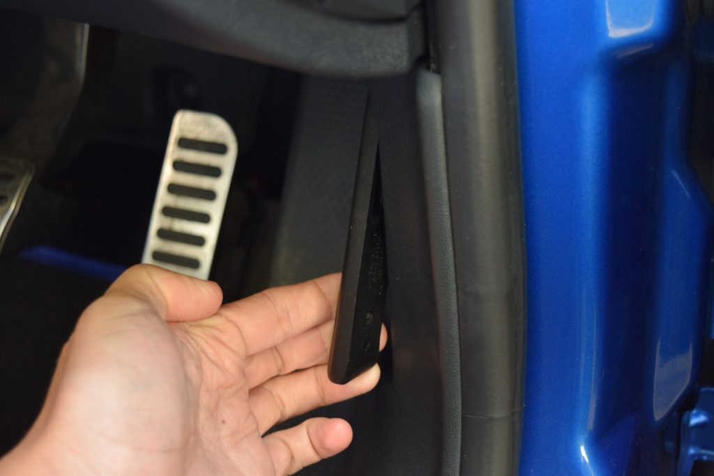 Pull the bonnet catch in the driver foot well